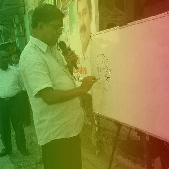 വരവിചാരം ലോഗോ പ്രകാശനവും തൽസമയം കാർട്ടൂൺ രചനയും