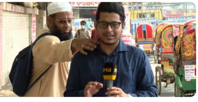 ലൈവിനിടെ മാധ്യമപ്രവർത്തകൻ്റെ കോളർ ശരിയാക്കി അപരിചിതൻ- വീഡിയോ വൈറൽ